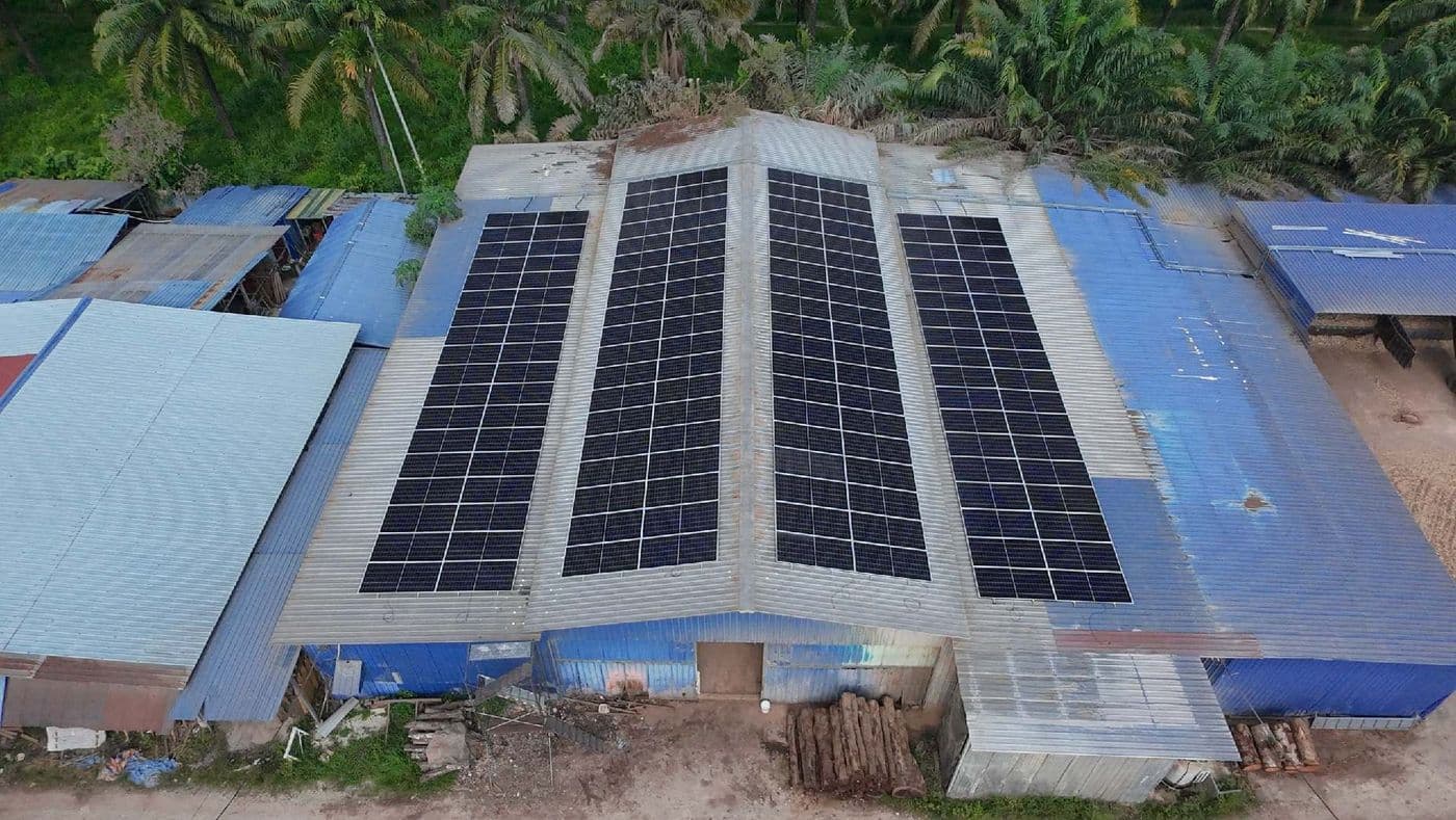Solar panels across the Teng Tatt factory roof, seen from a drone